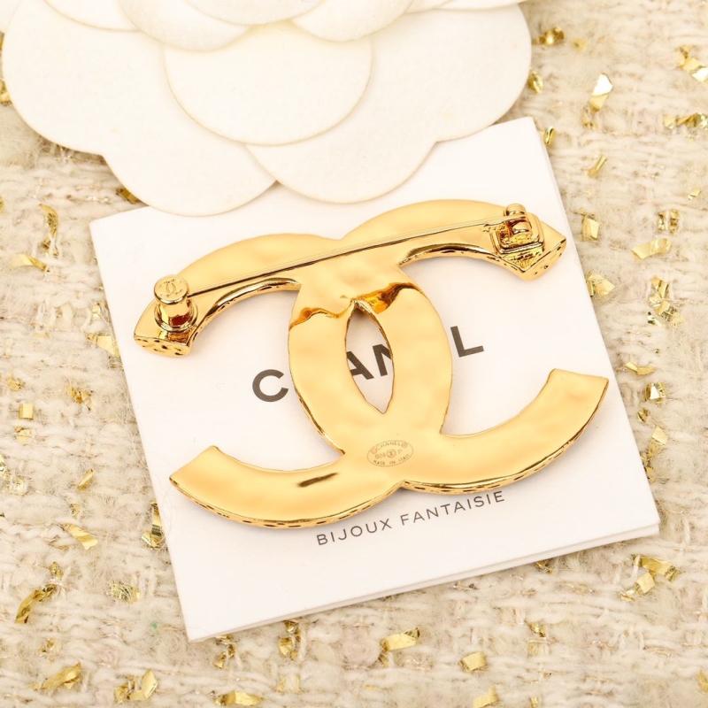 Ch**el brooches